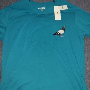 Staple pigion brand new. To small for me ..brand new!